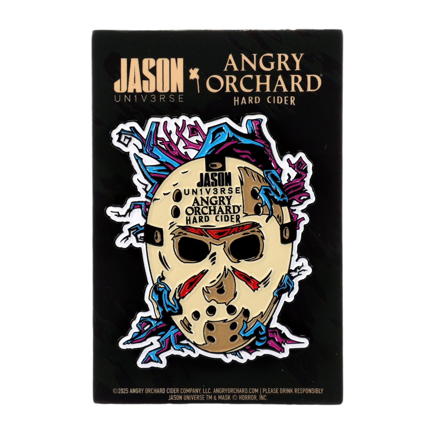 Enamel pin features Jason Universe mask on a black background with purple and blue branches enwrapping the mask, there is writing "JASON Un1v3rse x Angry Orchard Hard Cider".