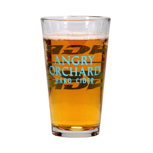 Sixteen-ounce pint glass filled with cider featuring writing "Angry Orchard Hard Cider".