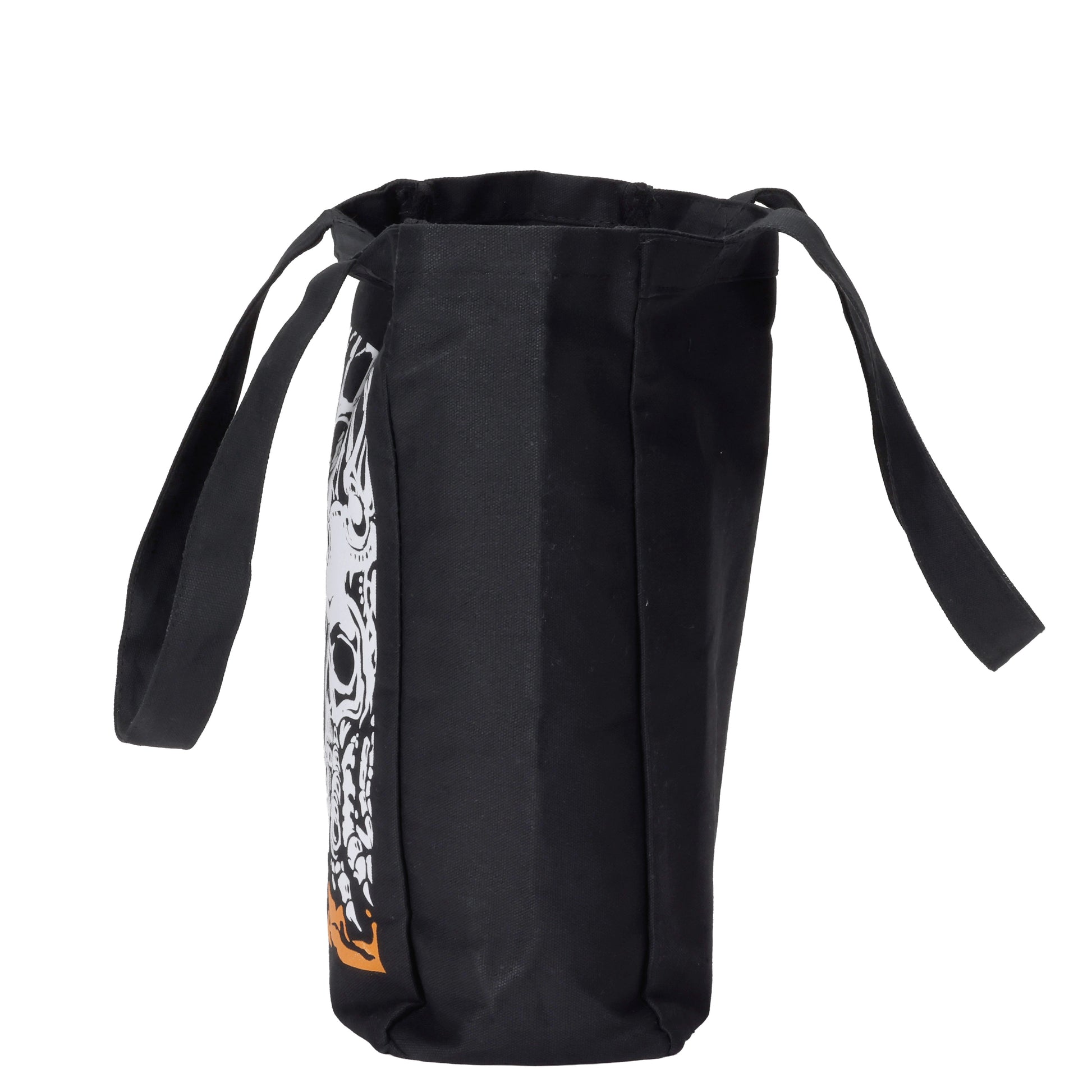 Side view of black tote bag with Angry Orchard Hard Cider design featuring a skull inspired tree design. 