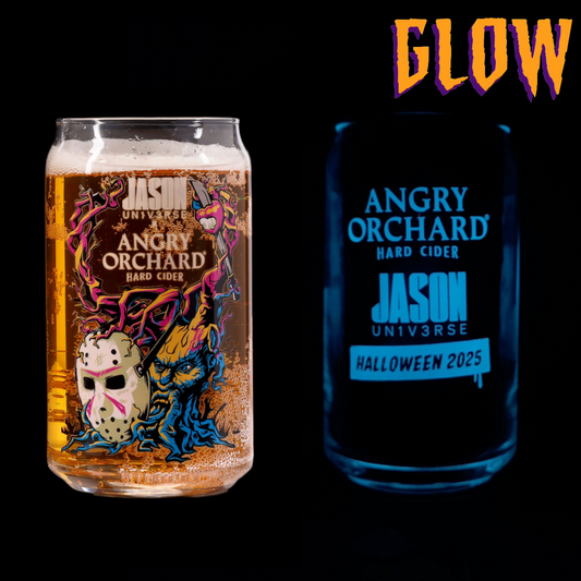 Two cans of Angry Orchard hard cider with Halloween-themed labels on a black background. Word GLOW to describe one glass's glow in the dark feature.